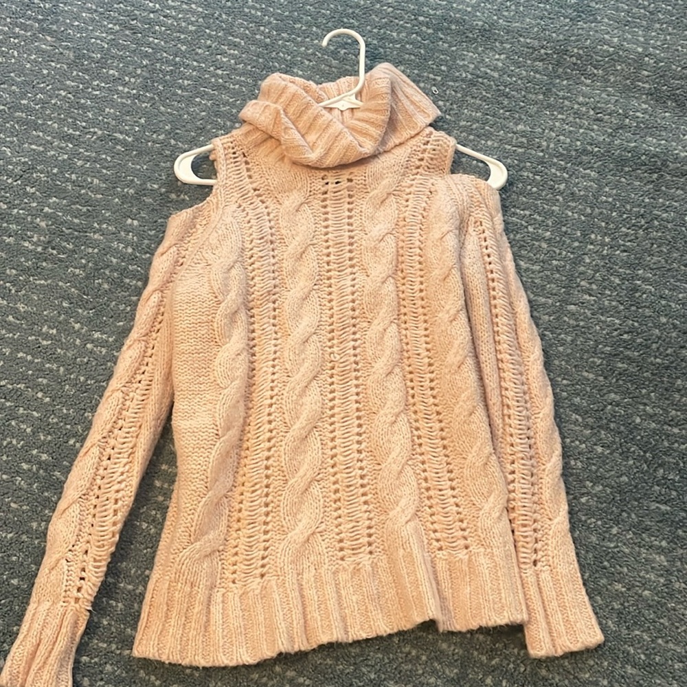 Pink of the shoulder sweater